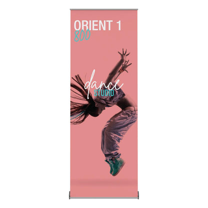 Retractable banner stand with dynamic dance studio advertisement for trade shows and exhibitions