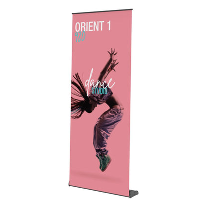Retractable banner stand displaying dance studio advertisement for trade shows and exhibitions