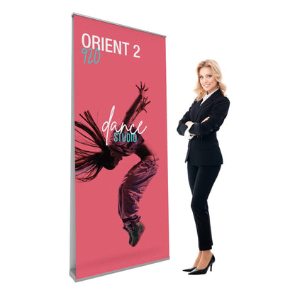 Double-sided banner stand displaying dance studio design with a woman in business attire, suitable for trade shows and events