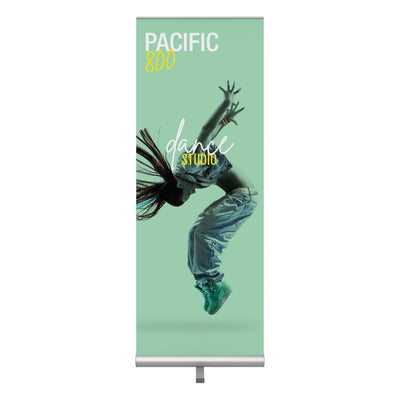 Retractable banner stand with dynamic dance studio advertising for trade shows and exhibitions