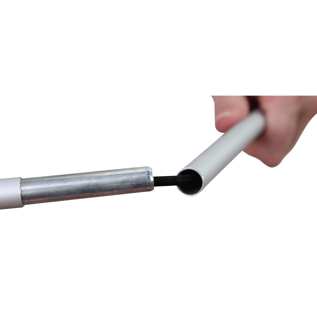 Close-up of hand connecting parts of a portable metal pole for trade show display setup