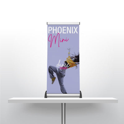 Compact mini banner stand on table showcasing dance studio promotion for trade shows and events