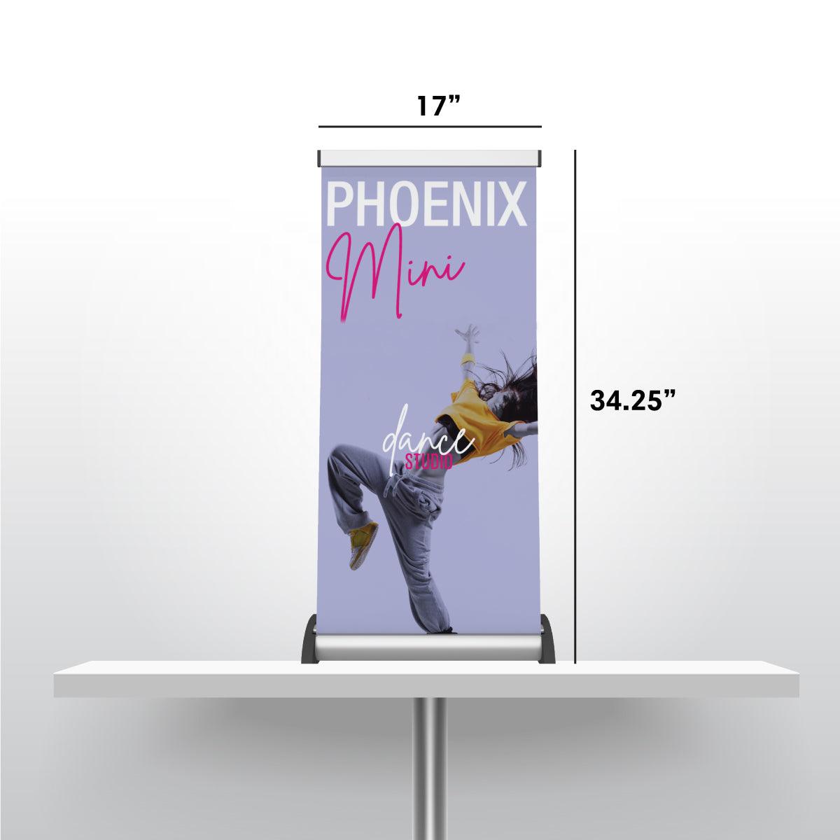 Compact Phoenix Mini banner stand on a table featuring dynamic dance studio graphics for trade shows and exhibitions