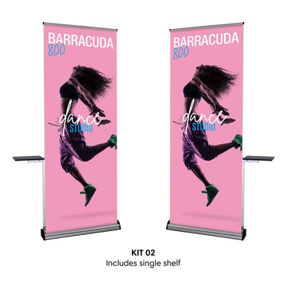 Retractable trade show banner stand with single shelf displaying dance studio advertisement for exhibitions and events