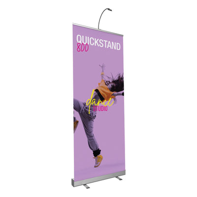 Quickstand banner stand displaying dance studio advertisement for trade shows and special events