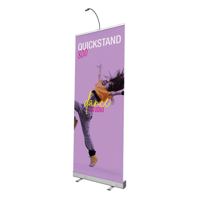 Roll-up banner stand with dance studio advertisement, ideal for trade shows and exhibitions