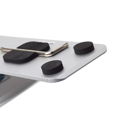 Close-up of a rigid sign panel base with protective black foam pads and an Allen wrench, used for trade shows and exhibitions