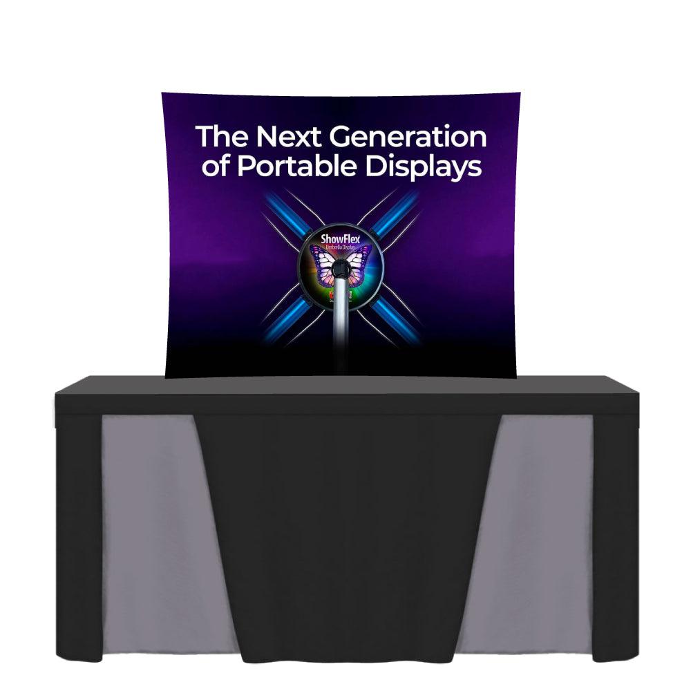 Portable tabletop trade show display with branded backdrop showcasing product advertising