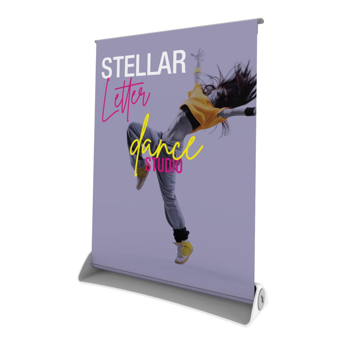 Promotional tabletop banner stand featuring dynamic dance studio advertisement for trade shows and exhibitions