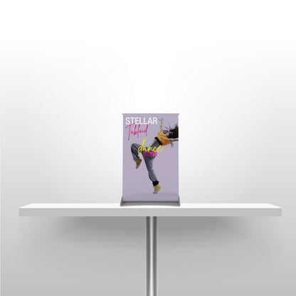 Compact tabletop banner stand promoting a dance studio for trade shows and exhibitions