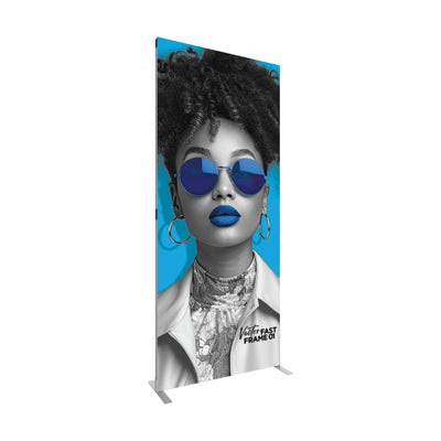Slim freestanding fabric display frame featuring modern portrait graphic for trade shows and exhibitions