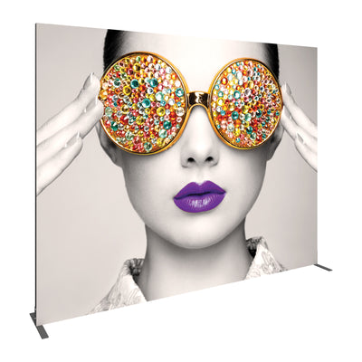 Large graphic display featuring a close-up portrait of a woman with embellished oversized glasses and vibrant lips, ideal for trade shows and exhibitions