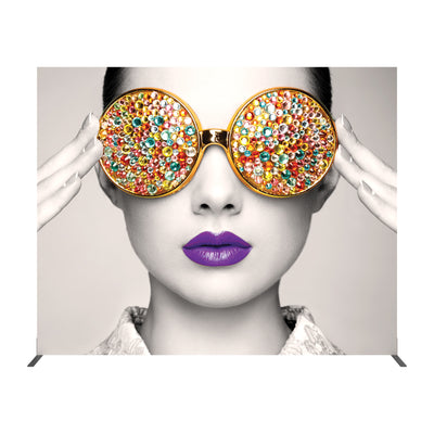 Trade show backdrop with artistic close-up of a woman's face wearing embellished round glasses for exhibitions and events