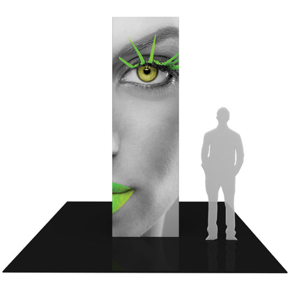 Tall rectangular trade show tower display with close-up face graphic and green accent details