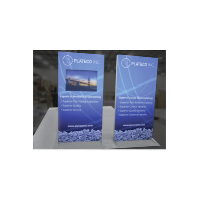 Two freestanding trade show banners for Plateco Inc. showcasing zinc plating and electroplating services