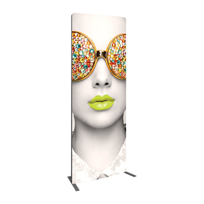 Tall fabric display panel featuring close-up of a face with embellished sunglasses and colored lips for trade shows