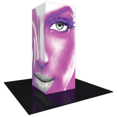 Backlit tower display featuring stylized close-up face graphic for trade shows and exhibitions