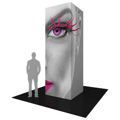 Large vertical trade show tower with close-up eye and lips graphic for exhibition display
