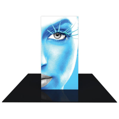 Backlit tower display with close-up face graphic for trade show and exhibition booth