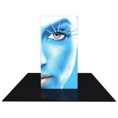 Backlit tower display with close-up face graphic for trade show and exhibition booth