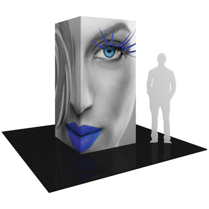 Tall rectangular trade show tower exhibit with large artistic face graphic and blue accents