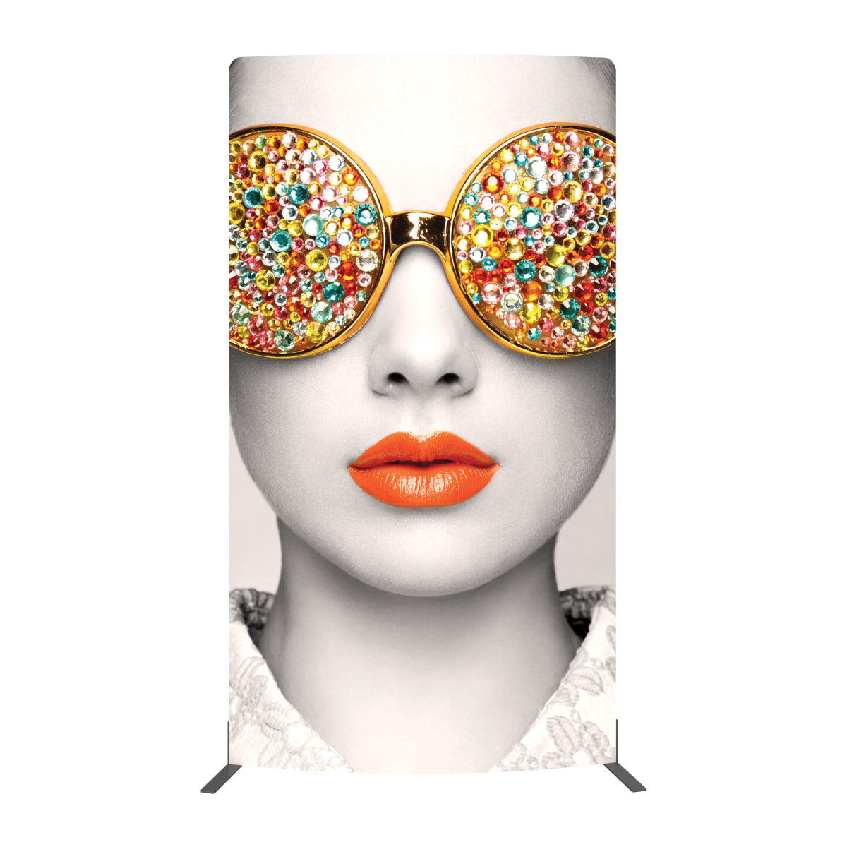 Large graphic display featuring close-up of face with decorative round sunglasses and bold lipstick for trade shows