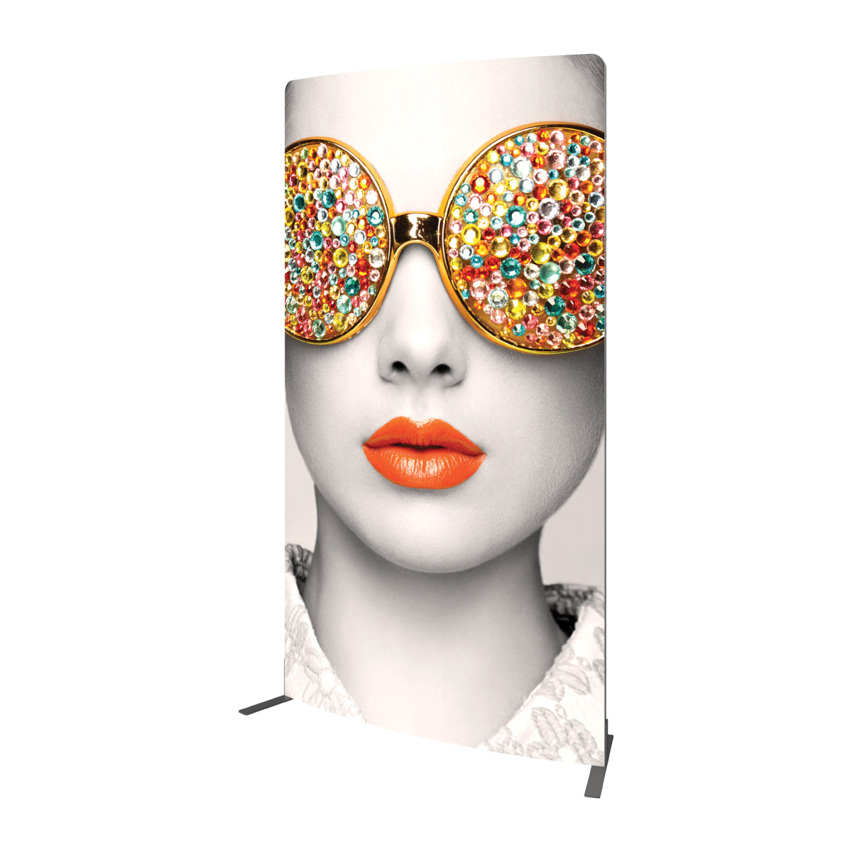 Large fabric display panel featuring a close-up artistic face with embellished sunglasses for trade shows and exhibitions