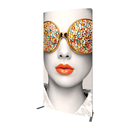 Large fabric display panel featuring a close-up artistic face with embellished sunglasses for trade shows and exhibitions