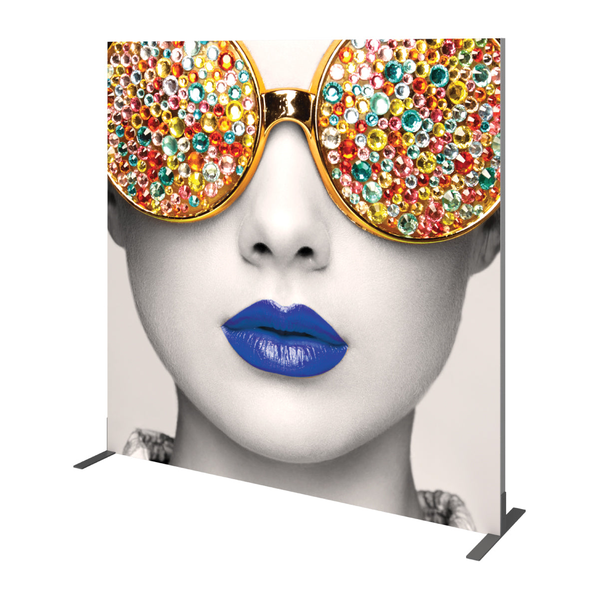 Large trade show backdrop featuring a close-up black-and-white face with embellished oversized sunglasses and vibrant lips