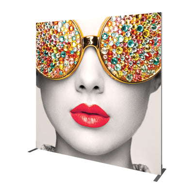Large graphic display featuring close-up face with jeweled sunglasses and red lips for trade shows and exhibitions