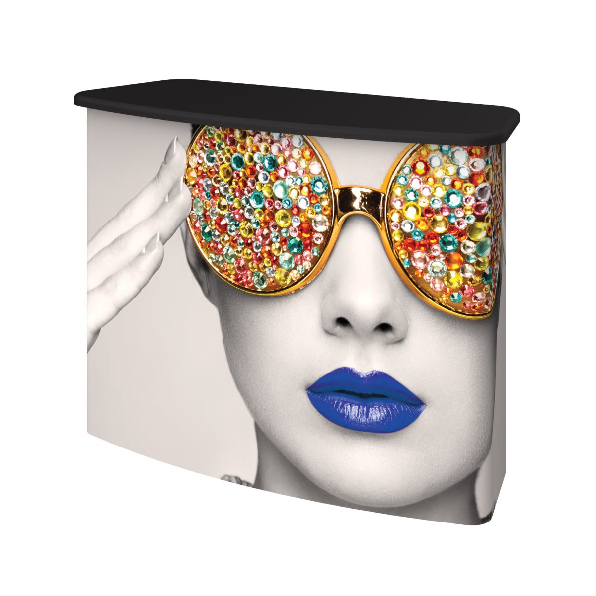 trade show counter with large graphic of woman wearing gem-studded sunglasses and bold lips for exhibitions