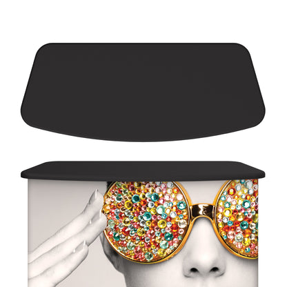 Portable trade show counter with graphic print of person wearing gemstone-studded sunglasses for exhibitions