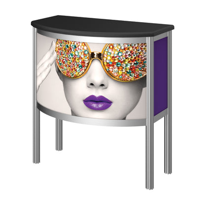 Curved promotional counter with vibrant graphic of a woman wearing embellished sunglasses for trade shows