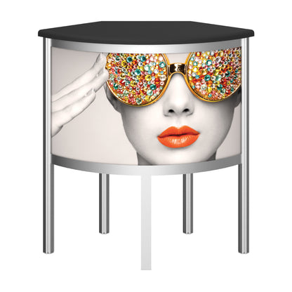 Round promotional counter with graphic of woman wearing embellished sunglasses and bright lips for trade shows