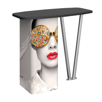 Trade show counter with artistic graphic of a woman wearing embellished sunglasses and red lipstick