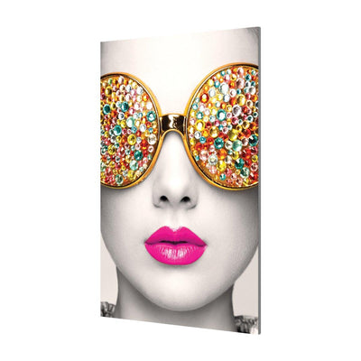 Close-up portrait wall display of a woman wearing oversized embellished sunglasses and bright lipstick for trade shows