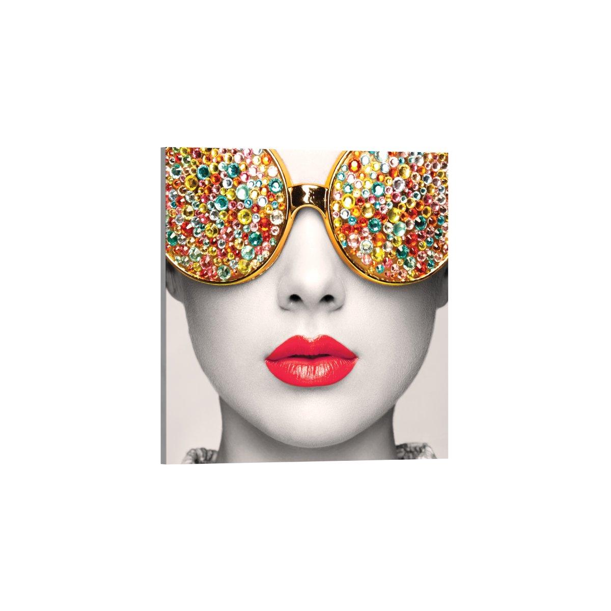 Close-up art display featuring a stylized face with gem-studded sunglasses, ideal for trade show exhibits