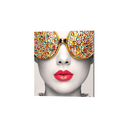 Exhibition wall display featuring a close-up portrait with embellished sunglasses and vibrant lips for trade shows