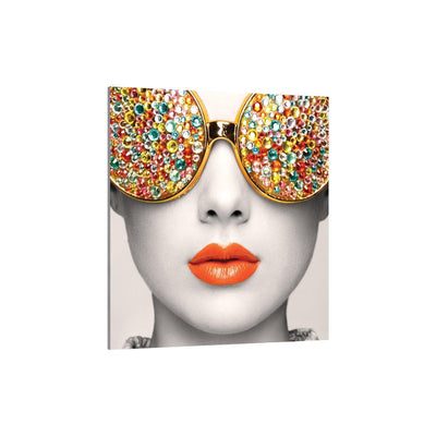 Close-up trade show display featuring modern artwork with jeweled glasses and vibrant lips for exhibition decor