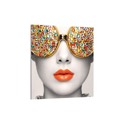 Close-up trade show display featuring modern artwork with jeweled glasses and vibrant lips for exhibition decor