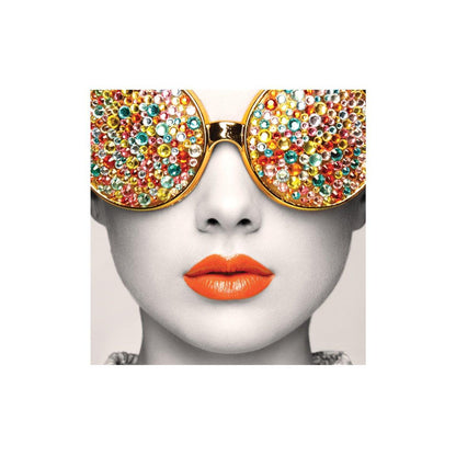 Close-up portrait with decorative eyewear featuring colorful gems for trade show displays