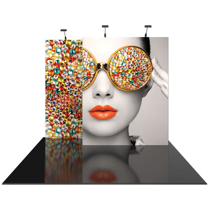 Trade show display with a large graphic of a woman wearing embellished sunglasses for exhibitions and events
