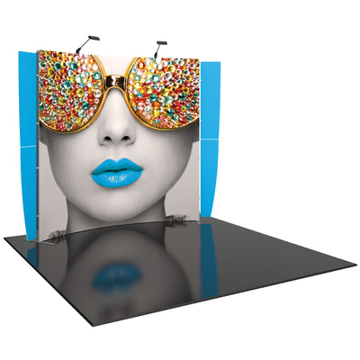 Trade show display with large graphic of a face wearing gem-encrusted sunglasses and bold lips