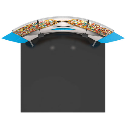 Curved trade show display booth with graphic of face wearing jeweled sunglasses and event lighting fixtures