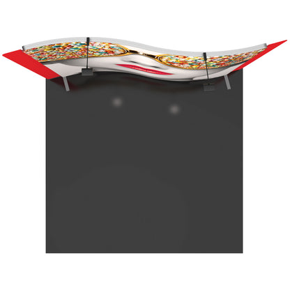 Curved trade show display with large graphic of face wearing decorative glasses and overhead lighting