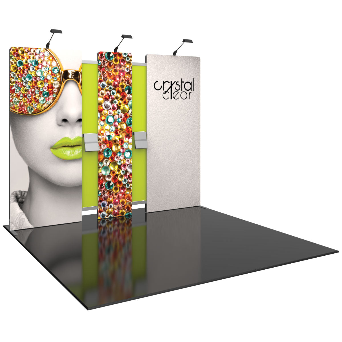 Trade show display with large vibrant graphics, modular panels, shelving, and overhead lights for exhibitions