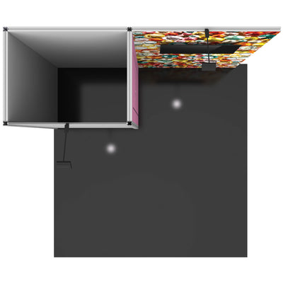 Overhead trade show booth setup with panel walls, large graphic display, and mounted screens for exhibitions