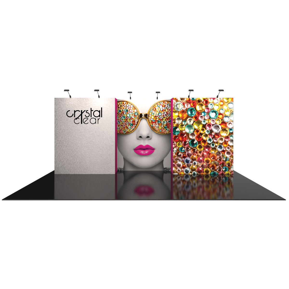 Trade show display with branded backdrop featuring graphic of woman wearing decorative glasses and sparkling design panels for exhibitions