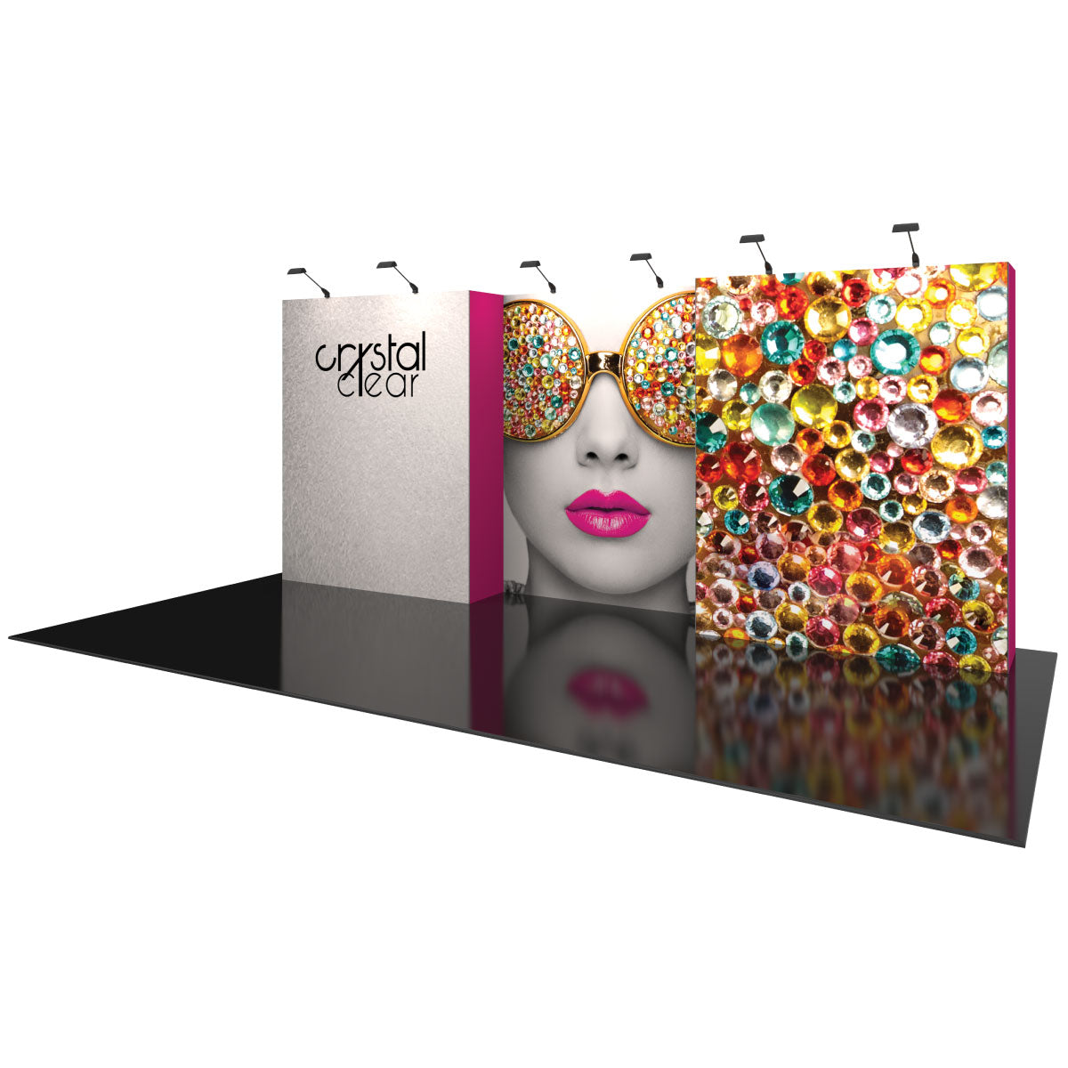 Trade show display with large graphic panels featuring sunglasses with jewels and text branding