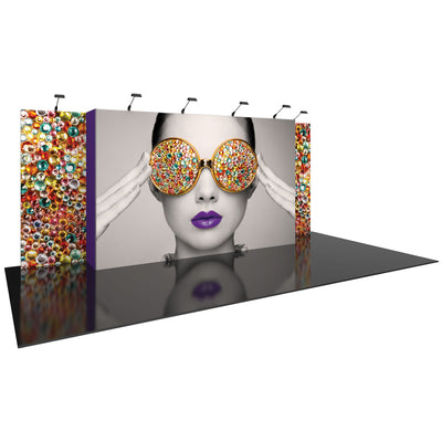 Large trade show booth with striking graphic of a woman wearing decorative sunglasses and lipstick on glossy floor